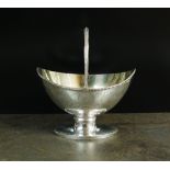 A George III silver swing handled sugar basket, Benjamin Mountigue, London 1784,