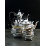 A matched Edwardian four piece silver tea and coffee service, Walker & Hall,