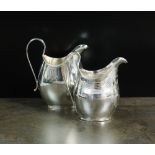 A George III silver cream jug, makers mark rubbed, London 1800,