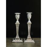 A pair of Victorian silver mounted candlesticks, Charles Stuart Harris, London 1898.