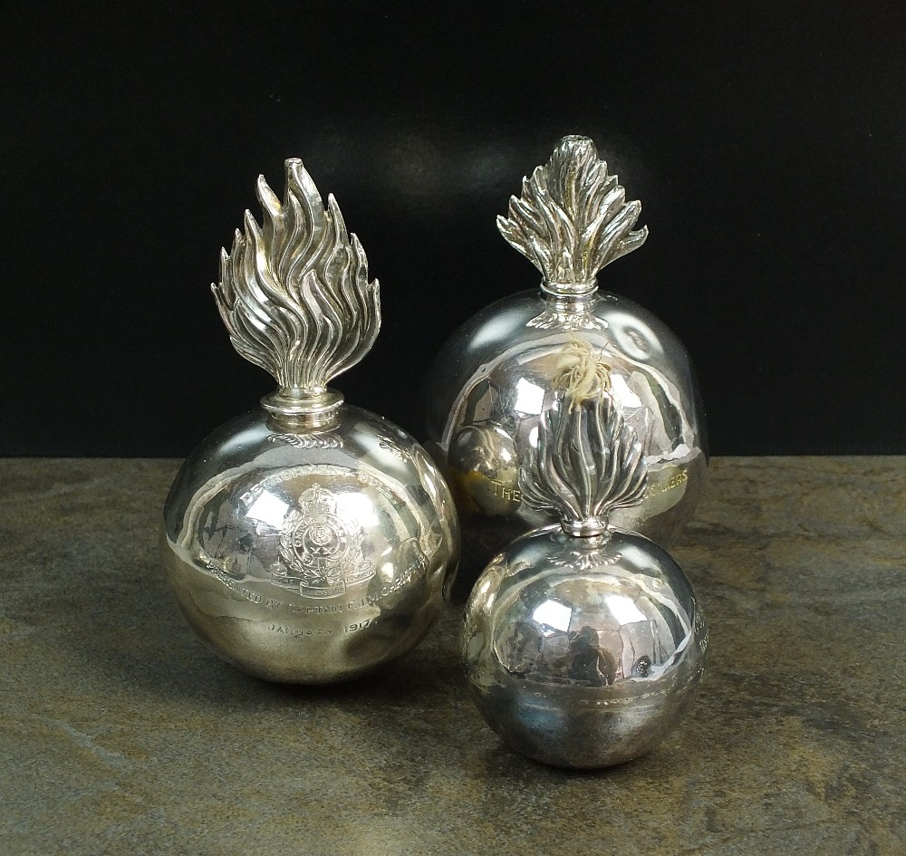 A Goldsmiths and Silversmiths silver grenade table lighter, London 1916,