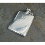 A silver hip flask, A J Zimmerman, Birmingham 1919,