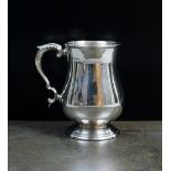 A Victorian silver baluster mug, FJL **, London 1884,