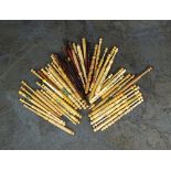 A large collection of turned wood lace bobbins, to include examples with inlaid wire,