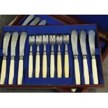 A Victorian cased set of silver fish knives and forks, J.