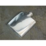 An Asprey & Co silver hip flask, Chester 1937, of plain polished form with hinged screw cap,