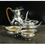 A Victorian matched four piece silver tea and coffee service, Walter & John Barnard, London 1892,