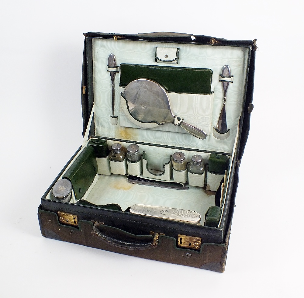 A cased travelling silver mounted vanity set, London and Birmingham,