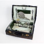 A cased travelling silver mounted vanity set, London and Birmingham,