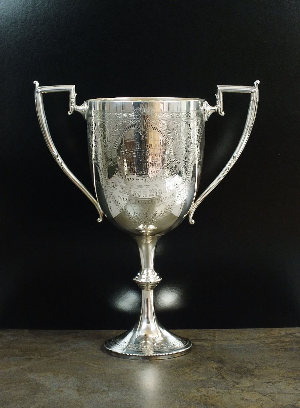 An Edwardian two handled silver trophy cup, I S Greenberg & Co, Birmingham 1901,