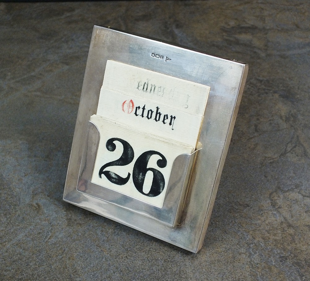 A silver mounted desk calendar, Walker & Hall, Sheffield 1910,