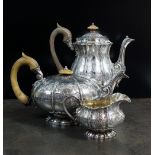 A George IV part three piece silver part tea service, W.E.