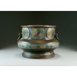 A Chinese cloisonne bronze jardiniere, Qing Dynasty, of bellied form with twin ring handles,