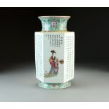 A Chinese famille rose vase, Republic, of hexagonal section with everted rim and foot,