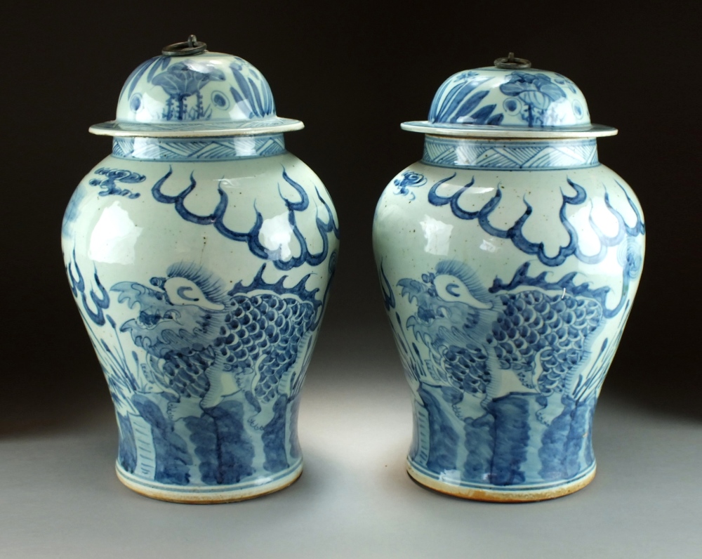 A near pair of Chinese blue and white jars and covers, 19th/20th Century,