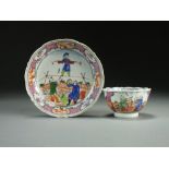 A Chinese famille rose porcelain teabowl and saucer, Qianlong,