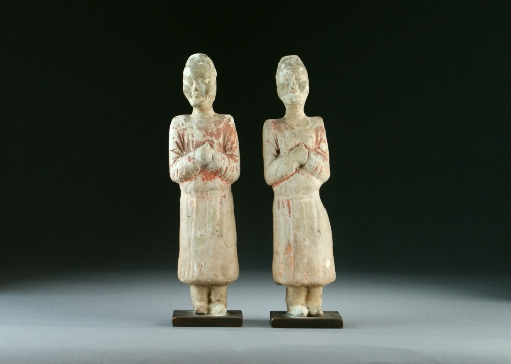 A pair of pottery figures of attendants, Han Dynasty,