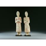 A pair of pottery figures of attendants, Han Dynasty,