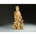 A Chinese soapstone figure of Guanyin, 19th Century,