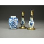 A pair of small Chinese blue and white brass mounted candlesticks, 17th/18th Century,