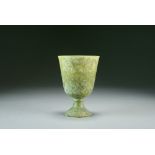 A Chinese celadon green jade stem cup, possibly Han Dynasty,