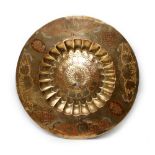 A large Sino-Tibetan brass enamelled tray or table top, of circular form with lobed verge,