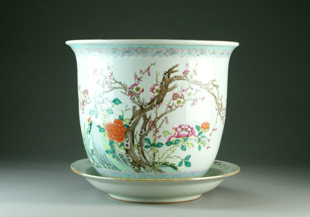 A Chinese famille rose jardiniere and stand, 18th Century, of fishbowl form with everted rim,