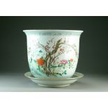 A Chinese famille rose jardiniere and stand, 18th Century, of fishbowl form with everted rim,