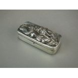 A Chinese silver snuff box, late 19th Century, of rectangular form with rounded corners,