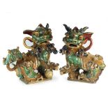 A very large pair of Chinese sancai glazed foo dogs, 19th Century,