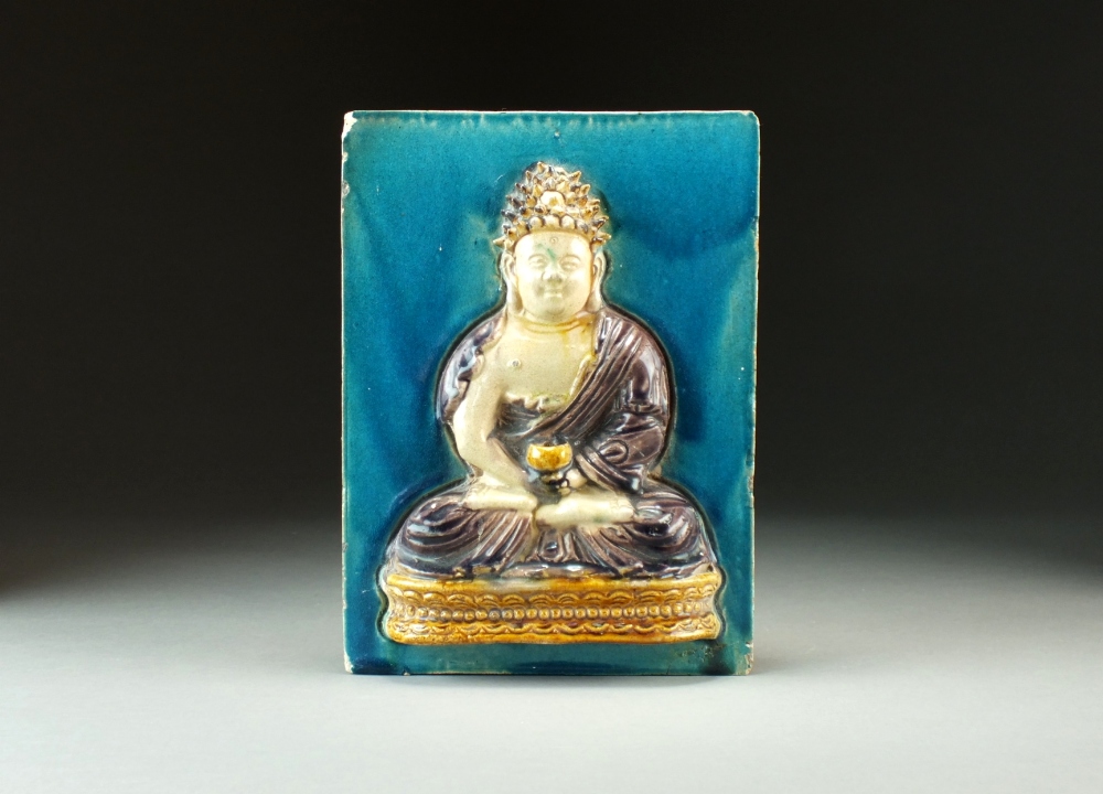 A Chinese sancai glazed brick or tile, Qing Dynasty,