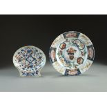 A Japanese Imari plate, Edo/Meiji period, of lobed circular form with reeded rim,