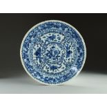 A Chinese blue and white dish, Qianlong seal mark but later,