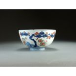 A Japanese Imari bowl, Edo/Meiji period, of rounded form and raised on a shallow foot ring,