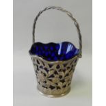 Three silver plated and leather mounted hip flasks together with a silver plated basket with blue