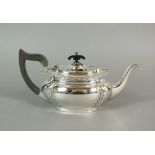 An Edwardian bachelors silver teapot, makers mark rubbed, Cester 1908,