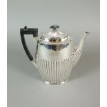 A silver coffee pot, James Dixon & Sons, Sheffield 1903, of oval half reeded form,