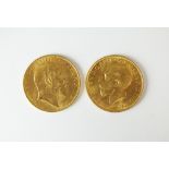 An Edward VII sovereign, dated 1909, together with a George V sovereign,