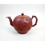 A Staffordshire redware teapot and associated cover, circa 1760,