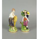 A matched pair of Bloor Derby figures of children with a sheaf of corn and bundle respectively