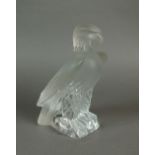 A Lalique moulded and frosted glass figure of an eagle,