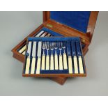 A cased part set of silver fruit knives and forks, William Eley II, London 1825,