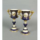 A pair of Coalport porcelain cobalt and gilt two handled goblets,