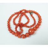 A graduated coral bead necklace,