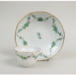A Bristol hard paste porcelain ogee shape teabowl and saucer, circa 1775,