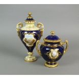 A Coalport porcelain cobalt and gilt two handled landscape vase and cover titled 'Hawthorn Dell'