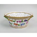 A Royal Copenhagen Flora Danica porcelain dessert basket of reticulated flared circular form with