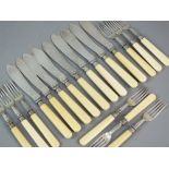 A set of twenty four silver fish knives and forks, Levesley Brothers, Sheffield 1897,