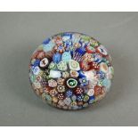 A small Baccarat millefiori glass paperweight, marked 'B1847',