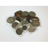 A collection of British coins, tokens etc, to include crowns dated 1935,